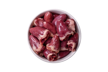 Raw chicken hearts with salt, spices and herbs