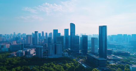 Fototapeta premium Aerial View of City Skyline and Skyscrapers Under Blue Sky and White Clouds