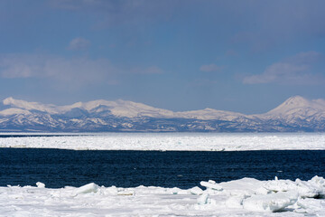 Shiretoko mountain and drift ice in Hokkaido japan  © 善弘 石垣