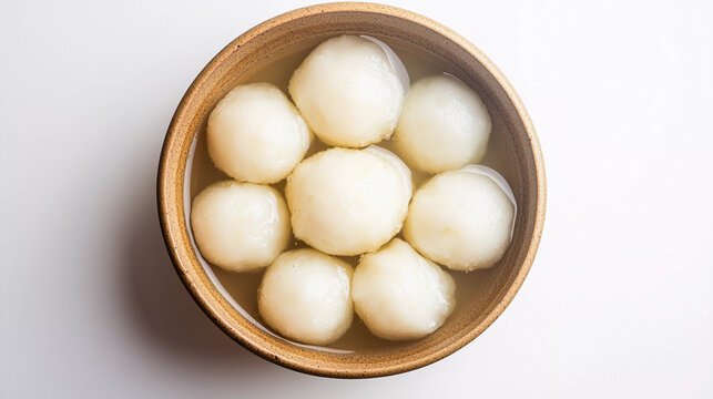 Famous bengali sweet dish rasgulla dipped in sugar syrup