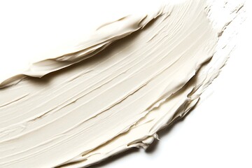 Delicate texture of white cream isolated on a white background. Selective focus.