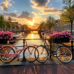 Obraz premium Idyllic sunset reflecting on Amsterdam canal with bicycle and flowers in view