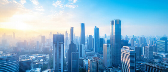 Fototapeta premium Aerial View of City Skyline and High-Rise Buildings Under Blue Sky and White Clouds