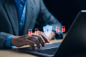 Cybersecurity and Global network security technology concept,Businessman protecting personal data on computer with virtual interface, internet secure technology ,firewall ,cyber security