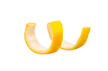 Swirly lemon peel curl isolated on white background
