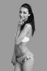 Naklejka premium young gorgeous blond woman in swimsuit