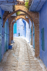 Archway in a blue street in the city of Chefchaouen. Morocco. 