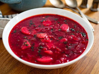 Ukrainian borscht bowl on wooden table