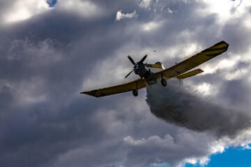 A light aircraft for extinguishing fires from the air in a rescue operation