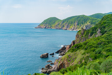Rocks on a rocky shore.

The South China Sea in the East of Vietnam. Hoa Tam Commune, Long Hoa...