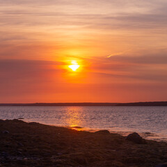 Smokey Sunset in Maine Caused Distorted Sun Effect