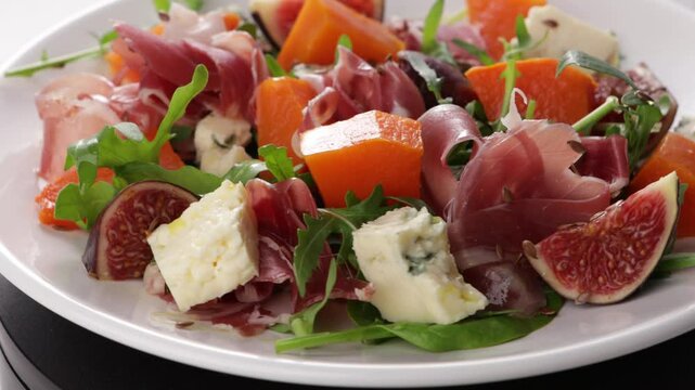 salad with  pumpkin and blue cheese jamon on plate food
