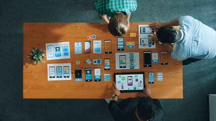 Top view of smart Ui designer brainstorming and planning about Ux Uo design or mobile interface...