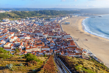 Aerial view of Nazare city and Praia da Nazare Beach, Portugal