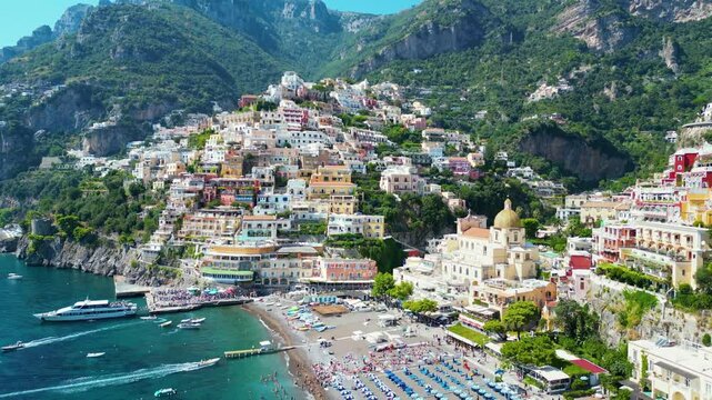 Colorful cascades houses, beach, boats, cliffs, Italian town Positano