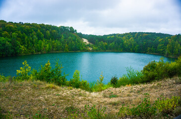 Jezioro Turkusowe, Wolin, Poland, zachodniopomorskie, Jezioro Turkusowe near Wapnica. Lake in Wolin National Park in Poland. Idyllic landscape with green nature by the lake. Turquoise lake.Beautifully