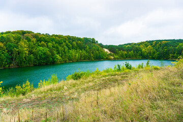 Jezioro Turkusowe, Wolin, Poland, zachodniopomorskie, Jezioro Turkusowe near Wapnica. Lake in Wolin National Park in Poland. Idyllic landscape with green nature by the lake. Turquoise lake.Beautifully