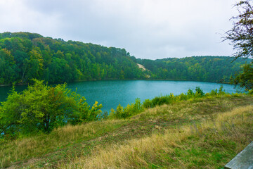 Jezioro Turkusowe, Wolin, Poland, zachodniopomorskie, Jezioro Turkusowe near Wapnica. Lake in Wolin National Park in Poland. Idyllic landscape with green nature by the lake. Turquoise lake.Beautifully