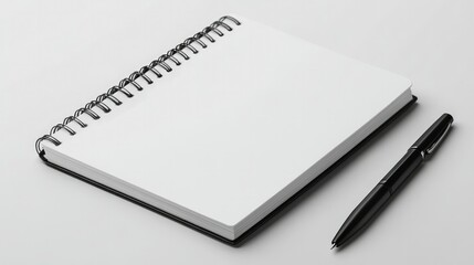 A notebook and pen white mockup on a clean surface, ready to display branding, logo designs, or motivational quotes.