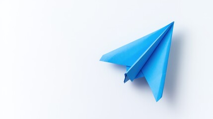 Blue paper airplane and business strategy on white background