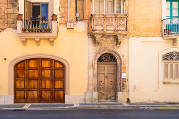 Traditional Maltese buildings with colourful balconies in historic city of Rabat, Malta