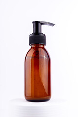 Single brown pump bottle for mock up. Sustainability and eco friendly lifestyle product concept..