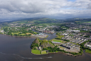 Fototapeta premium Dumbarton castle building on volcanic rock aerial view from above Scotland