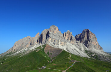 mountain group of sasso lungo and sella in the alps of italy with the five fingers mountain said to...