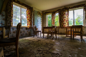 cafe in decay with old chairs and tables