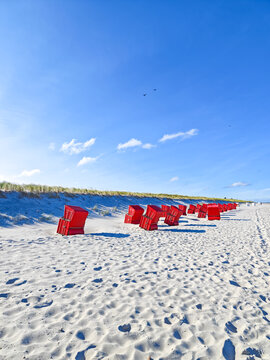 red beach chair on a beach