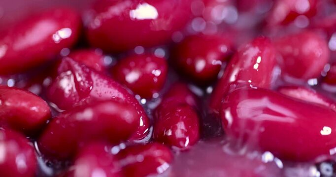 red canned beans in close-up, open canned red beans in brine