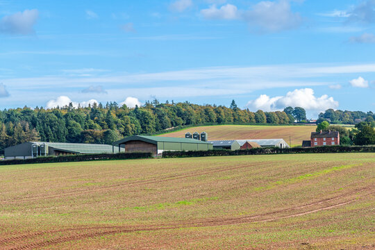UK Farm, farm buildings and farmland after harvest