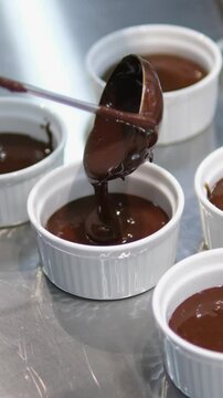 pour fondant into molds Cooking chocolate fondant, pouring into molds, process