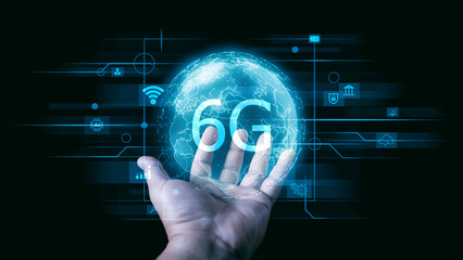 Businessman holding global network connection on 6G technology and futuristic advancement, uture technology 6G network internet of thinks connection communication, high-speed internet network signal.