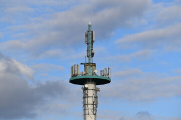 Radio tower or radio mast, blue sky, good cell phone reception, digital change