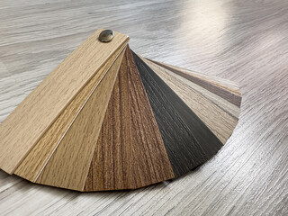  wooden vinyl samples of laminate or parquet close up