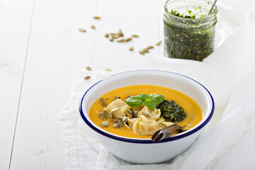 Pumpkin cream soup with cheese tortellini