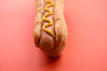 Hot dog with yellow mustard