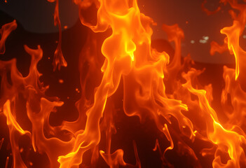 Fototapeta premium Intense orange flames dancing against a dark background for fire and heat concepts