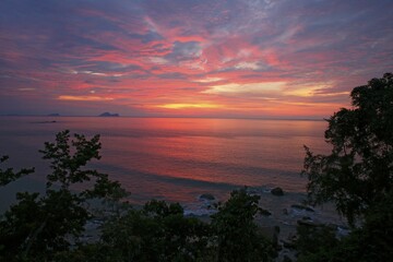 Sunset over the South China Sea, coast at Permai Rainforest, Sarawak, Borneo, Malaysia, Asia