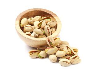 Tasty pistachio nuts in bowl isolated on white