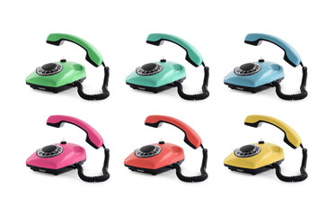Old telephone with rotary dial of different colors isolated on white, set