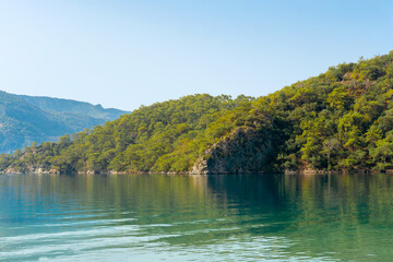 Obraz premium Calm Blue Lagoon on a Clear Summer Day – A Tropical Paradise for Relaxation
