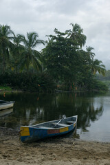 Boat on a beach next to Mendihuaca river, Colombia