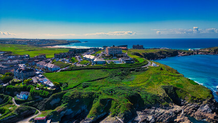 Aerial View of Coastal Town with Ocean and Green Hills at Towan Beach, Newquay, Cornwall.