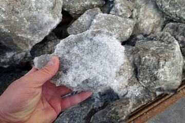 natural rock salt extracted from underground, close-up view of a large piece of rock salt,