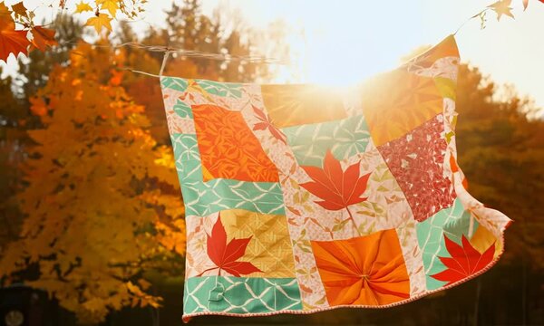 A patchwork quilt drying in the autumn breeze. Video