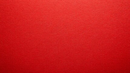 Sheet of red paper texture background, showcasing a smooth, vibrant red surface with subtle tonal variations