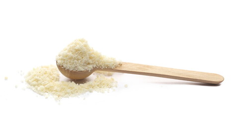 Parmesan cheese grated in wooden spoon isolated on white