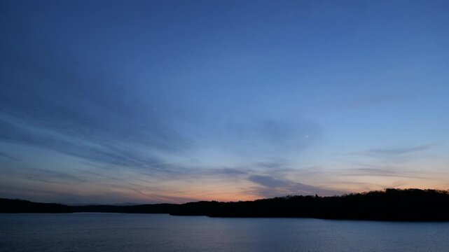 (SDR 709 10bit 4:2:2 H.264) - 4K Video Lake Sayama during the blue hour. Mt.Fuji and the crescent moon in Japan.